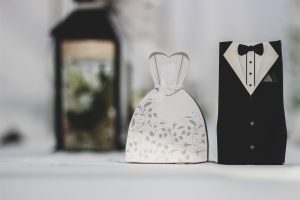 white and black groom and bride dress and suit decor